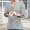 Detailed view of men's casual deep V-neck slim fit ribbed knit long sleeve shirt in grey - Medium Grey