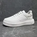 Men's white leather platform sneaker with triangular texture and foam sole. - 38 / White