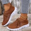 Side view of breathable brown flying woven mesh sneakers with white soles and laces - Brown