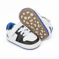 Detailed view of baby walking shoes with non-slip rubber sole and blue velcro strap - 11cm Inner Length / Blue