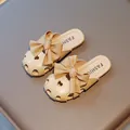 Stylish beige girls' closed-toe slippers featuring a large decorative bow and heart cutouts - 23 / Khaki