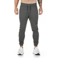 Dunkelgraue Slim Fit Jogginghose für Herren mit elastischem Tunnelzug und Reißverschlusstasche - Dunkelgrau