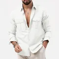 Close-up of men's white long-sleeve workwear jacket with chest pockets and turn-down collar - S / Tops / White