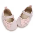 Detailansicht von rosa Glitzer-Prinzessinenschuhen für Babys mit weicher Schleifendekoration - Rosa