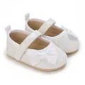 Detailansicht weißer Glitzer-Prinzessin-Babyschuhe mit eleganter Schleife. - Weiß