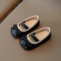 Elegant girls' black sequin Mary Jane flats with bow detail and elastic strap - Black