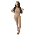 Detail shot of a women's two-piece ribbed long sleeve crop top and leggings loungewear set. - S / Top And Bottom / Apricot
