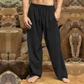 Close-up of men's loose breathable black hip-hop trousers in outdoor setting - S / Bottoms / Black