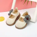 Adorable toddler girl's cream Mary Jane shoes featuring a large houndstooth fabric flower - Internal Length 11.5cm / Houndstooth Flower Style (38MBX6905) / Beige