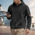 Detailed view of black fleece zip hoodie with American flag patch on a cruise deck - S / Tops / Black