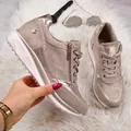 Detailed view of taupe women's platform sneakers with rhinestones and side zipper. - Beige