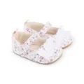 Detailed view of baby girl floral walking shoes with white lace ruffles and strap. - Light Purple