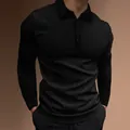 Close-up view of a men's slim-fit long-sleeved ribbed polo shirt in solid black - Black