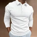 Detail view of a men's white long-sleeved polo shirt with vertical ribbed texture and lapel - S / Tops / White