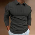 Detail shot of a men's slim fit long sleeve polo shirt with vertical ribbed texture - Dark Gray