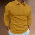 Mustard yellow men's slim fit polo shirt with vertical ribbed texture and long sleeves. - Turmeric