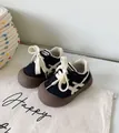 Chaussures de marche noires pour bébé avec doublure chaude et semelles brunes - Noir