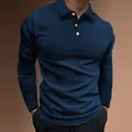 Detail view of a men's navy blue long sleeve slim fit polo shirt for athletic wear - M / Tops / Navy Blue
