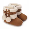 Warm brown baby winter boots featuring plush fur trim, cute bow, and pom-pom details - Dark Brown