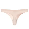 Seamless ice silk thong for women in nude color with soft cotton crotch detail view - M / Bottoms / Nude