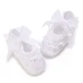 Close-up of white baby princess shoes featuring delicate lace flowers and satin bows - Large Bow 3D Flower Style (K-10) / 9CM Bottom Length / White
