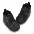 Close-up view of black high-top baby boots with soft soles and Velcro straps - Inner Length 11cm / Black