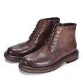 Detailed side view of men's brown leather brogue boots with wingtip and zipper. - 38 / Dark Brown