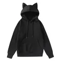 Vista detallada de sudadera negra con capucha para mujer con orejas de gato suaves - S / Tops / Negro