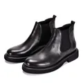 Detailed side view of black genuine leather men's Chelsea boots with thick soles - 38 / Black