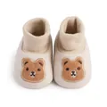 Close-up view of soft indoor baby booties with cute embroidered brown bear face - 11cm / Apricot