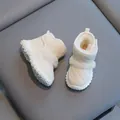 Creamy white plush-lined winter snow boots for toddlers featuring a stylish quilted design - White