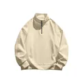 Detailed macro shot of cream men's half-zip fleece sweatshirt with stand collar. - Apricot