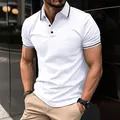 Close-up of white men's polo shirt with black tipped collar and sleeve cuffs - S / Tops / White