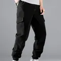 Men's black multi-pocket cargo joggers with elasticated cuffs and drawstring waist. - M / Bottoms / Black
