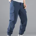 Modern men's multi-pocket cargo jogger pants in stylish fog blue with elastic cuffs - Navy Blue