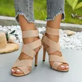 Elegant beige high heel sandals featuring elastic criss-cross straps and a secure back zipper - Apricot Yellow