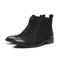 Bottines Martin en cuir noir pour hommes avec détails richelieu et lacets classiques. - Noir