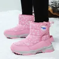 Pink children's high-top snow boots featuring white snowflake patterns and velcro straps. - 26 / Pink