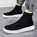Black breathable fly-knit high-top sock sneakers with thick white soles. - 35 / Black and White