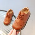 Classic brown breathable leather brogues for children featuring comfortable soft rubber soles - EU 21 / Brown
