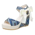 Bohemian ethnic pattern wedge sandals featuring a large cream bow and straw platform - Blue