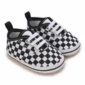 Close-up of black and white checkered canvas baby soft sole walking shoes for infants - Inner Length 11cm / Black