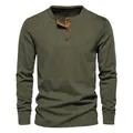 Detail view of men's olive green corduroy Henley shirt with ribbed texture and buttons - Army Green
