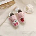 Close-up of pink baby walking shoes with embroidered strawberry and cherry motifs - Pink Strawberry Cherry Floral