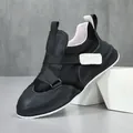 Black leather low-top men's sneakers with stylish Velcro straps and chunky sole - 38 / Black