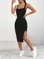 Detalle de un vestido ajustado de punto acanalado negro con abertura y corte slim - S / Top Y Pantalón / Negro