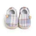 Detail of soft plaid baby walking shoes with plush lining and cute wooden bear decorations. - 11cm / Blue