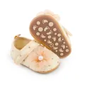 Detail view of infant lace princess shoes with large mesh flower and pearl. - 11cm / Apricot