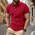Close-up detail of a slim-fit red polo shirt featuring striped collar and cuff accents. - S / Tops / Burgundy