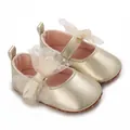Elegantes zapatos Mary Jane dorados para bebé niña con lazo decorativo y suelas antideslizanti. - Dorado